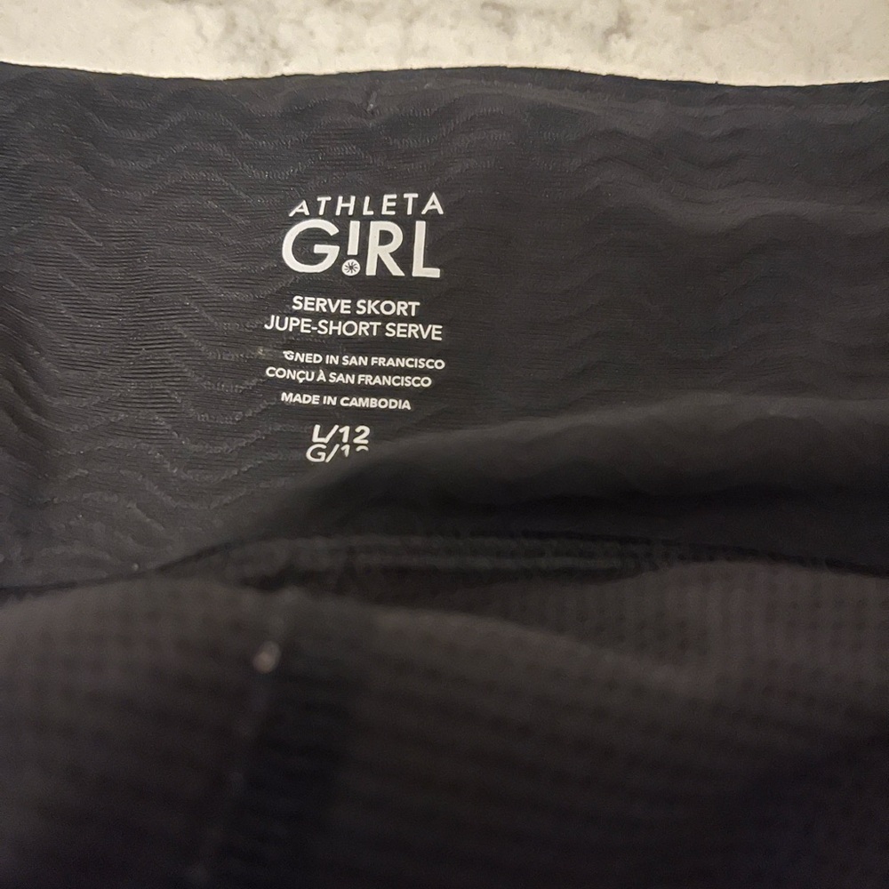 Lot of FIVE Athleta girls shorts and skorts size 12
3 skorts and 2 shorts